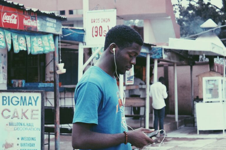 photo-1542321888-8a6abb3ec824 man on phone (1)